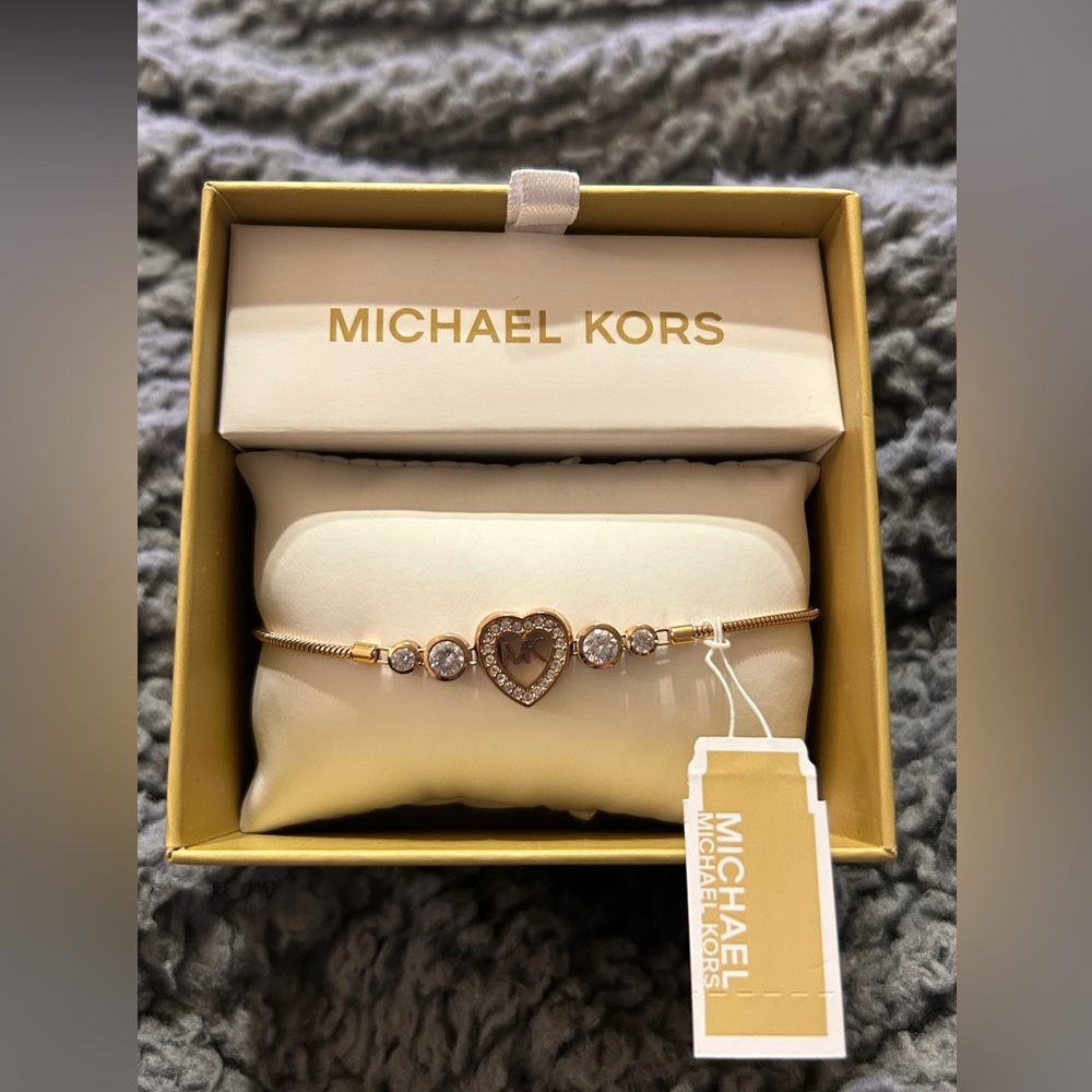 Michael Kors bracelet 
NWT
MK logo
Heart design